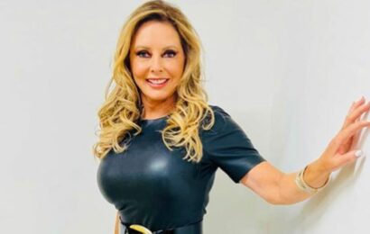 Carol Vorderman sparks frenzy as ‘unreal’ star squeezes curves into latex outfit