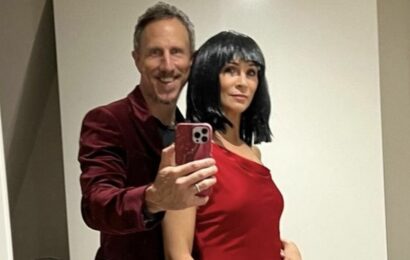 Andrea McLean looks unrecognisable as she sports black bob and slinky gown