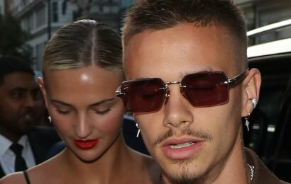 Romeo Beckham looks edgy with girlfriend Mia Regan at BECKHAM premiere