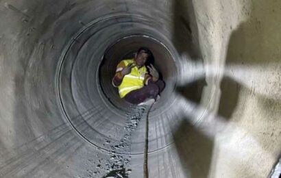 Trapped workers lifted rat-hole miners on their shoulders